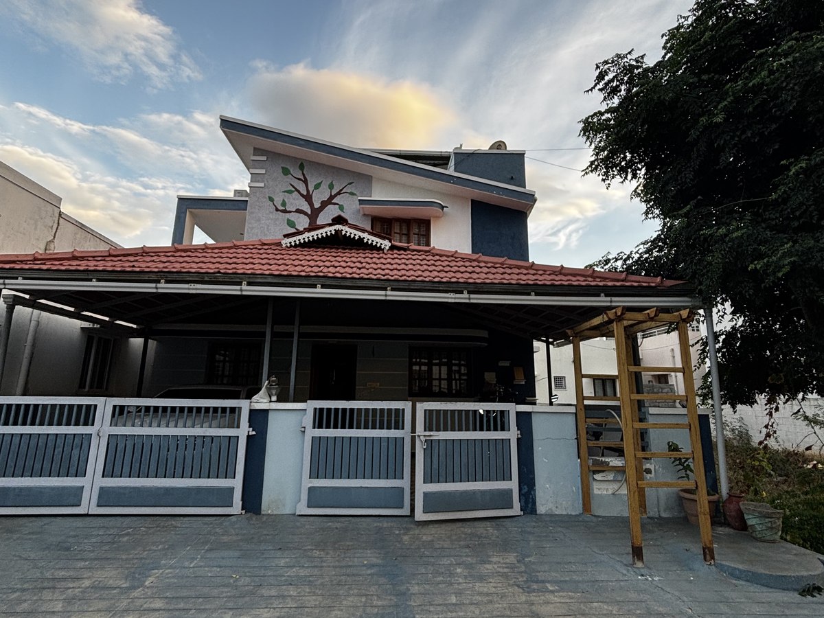 The completed Ground + 2 residence with its roofed verandah, built by Lakshmi Builders in Pannimadai, Coimbatore